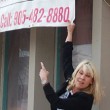 Sign bylaw unfair, owner says Sign bylaw unfair, owner says